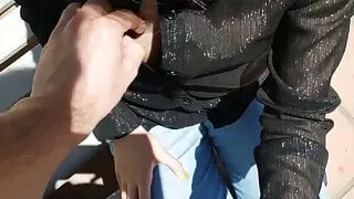 Asian girl gives blowjob on top of the roof