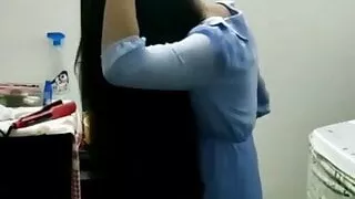 Indian girl with long black hairs combing