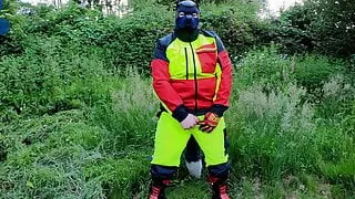 Forest Worker Pup pawing off in gear and boots (outdoors)