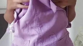 Stripping in a cute romper