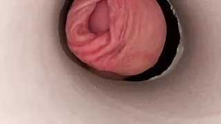 Imitation of a camera in the middle of a pussy