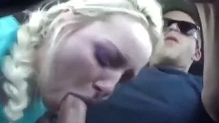 She sucks his cock while he drives the car