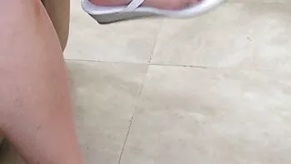 I tease and flap my sexy sandals with pretty red toes