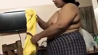 Wife changing dress after session