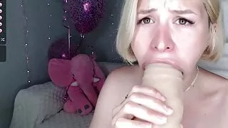 Slim girl has fun with a big dildo