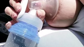 Pumping my big milk tits empty in the car