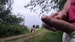 A man jerks off a member in public in front of a stranger