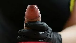 Masseuse fingering client with latex glove