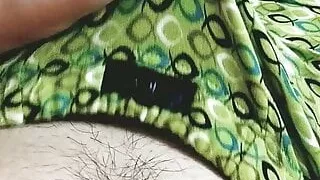 jerking off a dick in green panties