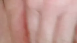 White cow fingers herself