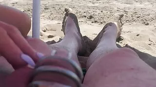 teasing in chastity on the beach
