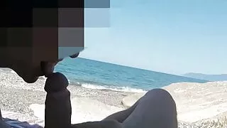 Girl sucks cock at public beach and gets caught by stranger