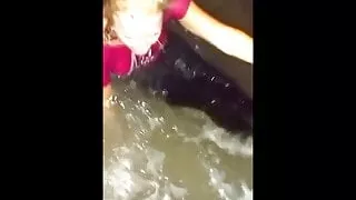 Beach at night in tight wet jeans