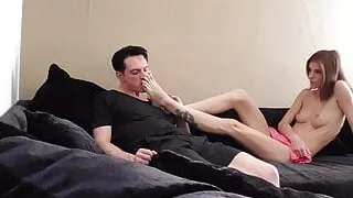 Bobby worships Ina’s feet on the couch.