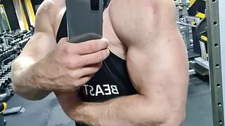 Muscular guy is doing excersises and jerking off