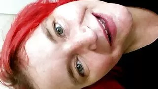 Redhead Jasper giving a blowjob