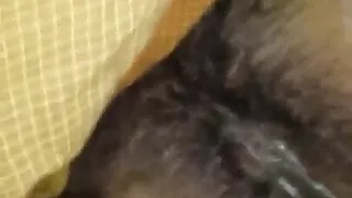 Showing her hairy and wet pussy