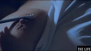 Rubbing her huge boobs as she fucks herself with a pencil