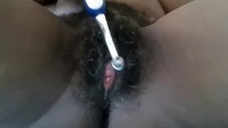 Mature 60 year ebony masturbating with electric toothbrush