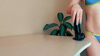 Beauty rides her favorite dildo