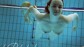 Big tits shaved babe Lada Poleshuk underwater