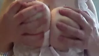 Curvy masked milf with huge tits plays with herself