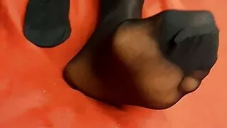 Ebony wearing black Nylons