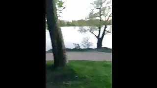 A naked guy walks in the park in public