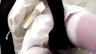 black nylon doll with short white wedding dress