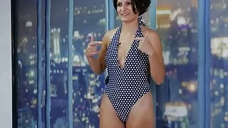 mature sexy brunette in swimsuit