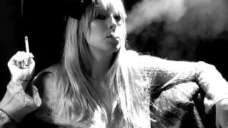 Blonde smokes seductlively