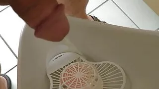 Matty Muse gay boy peeing in a male urinal with split stream