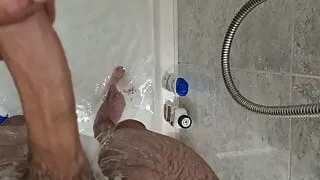 Giving his dick pleasure in the shower
