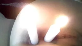 EXTREME - Two candles one in her pussy and one in her ass