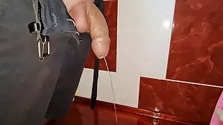 Small uncut cock pissing