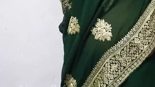Aunty in a Sexy Saree wearing a bra