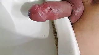 Nice pumped cock pissing