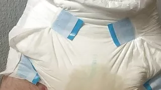 Diaper boy make big load of pee