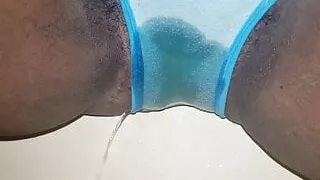 Peeing through panties