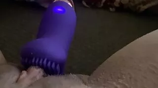 Blonde playing with vibrator