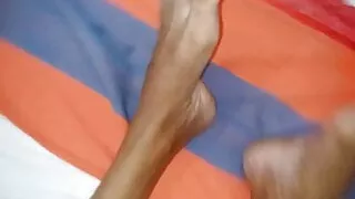 Hubby massages his wife’s foot in night