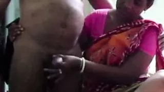 Indian Aunty in a Saree Jerking Dick