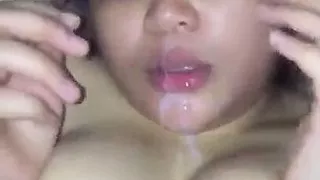 Amazing facial cumshot on a big tit Asian