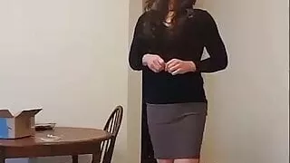 Off to work today in a gray skirt with black boots.