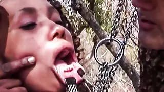 Ebony girl taken outdoor for hardcore BDSM punishment
