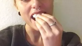 Naomi Woods eating popcorn