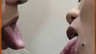 Asian milf and girl kissing