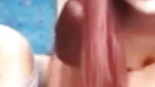 Friends kissing on camera