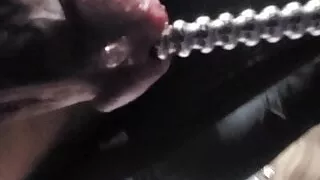 Fucking a ribbed sound with cumshot