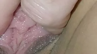 Playing with her wet pussy and her nipples